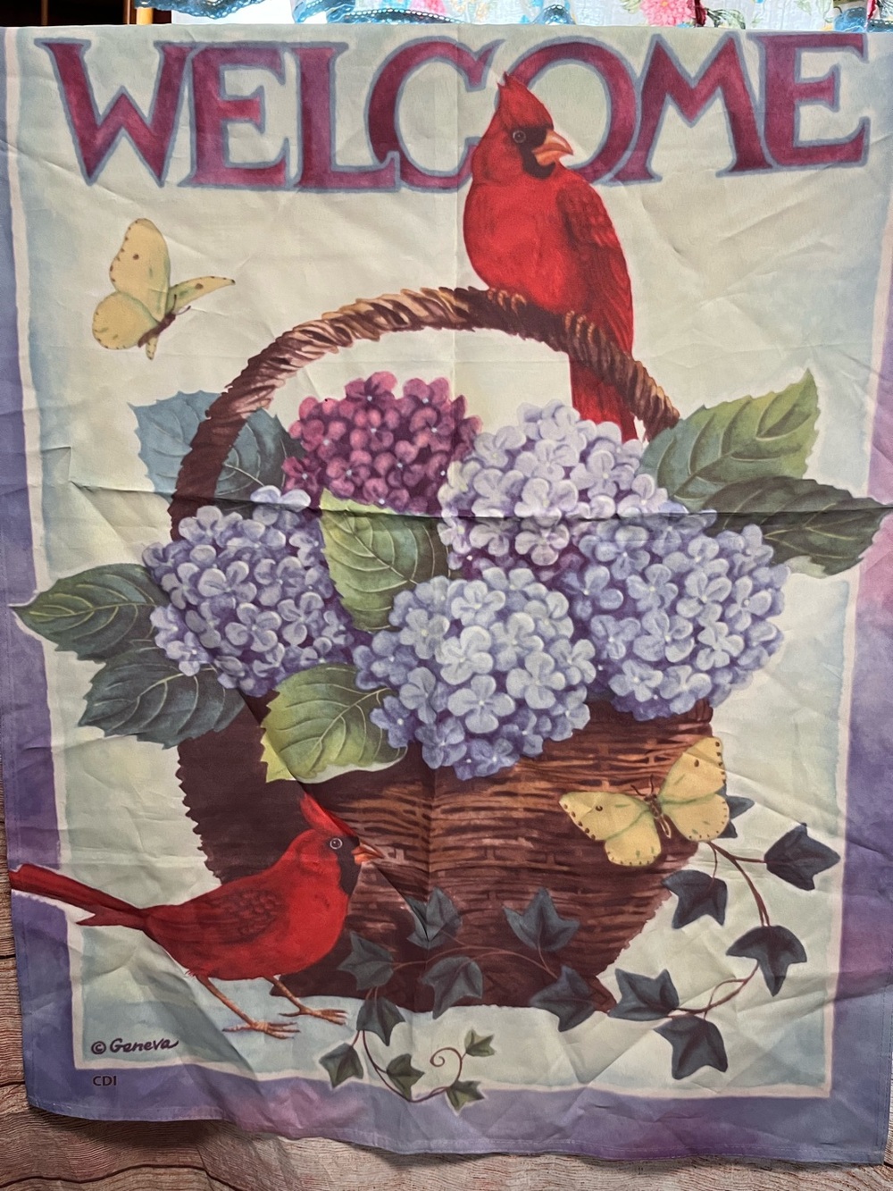 Welcome decorative flag with cardinals and flowers
